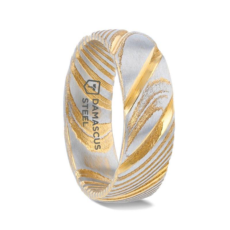 Two-tone gold and silver ring with 'Damascus Steel' branding on a white background