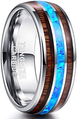 A silver tungsten carbide ring with blue opal inlay and wood pattern detailing, 8mm in width.
