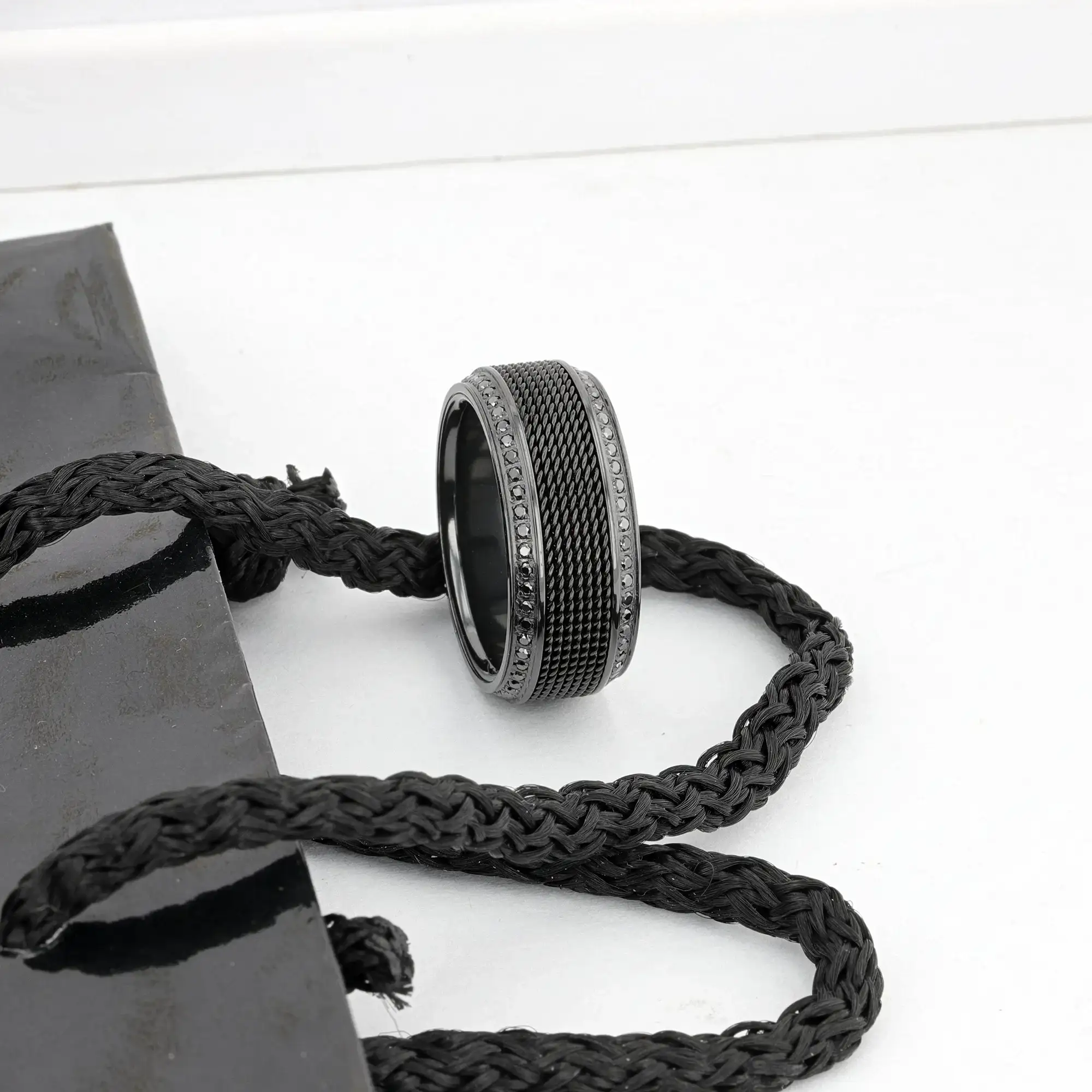 Thebes black titanium steel chain ring, close-up diamonds