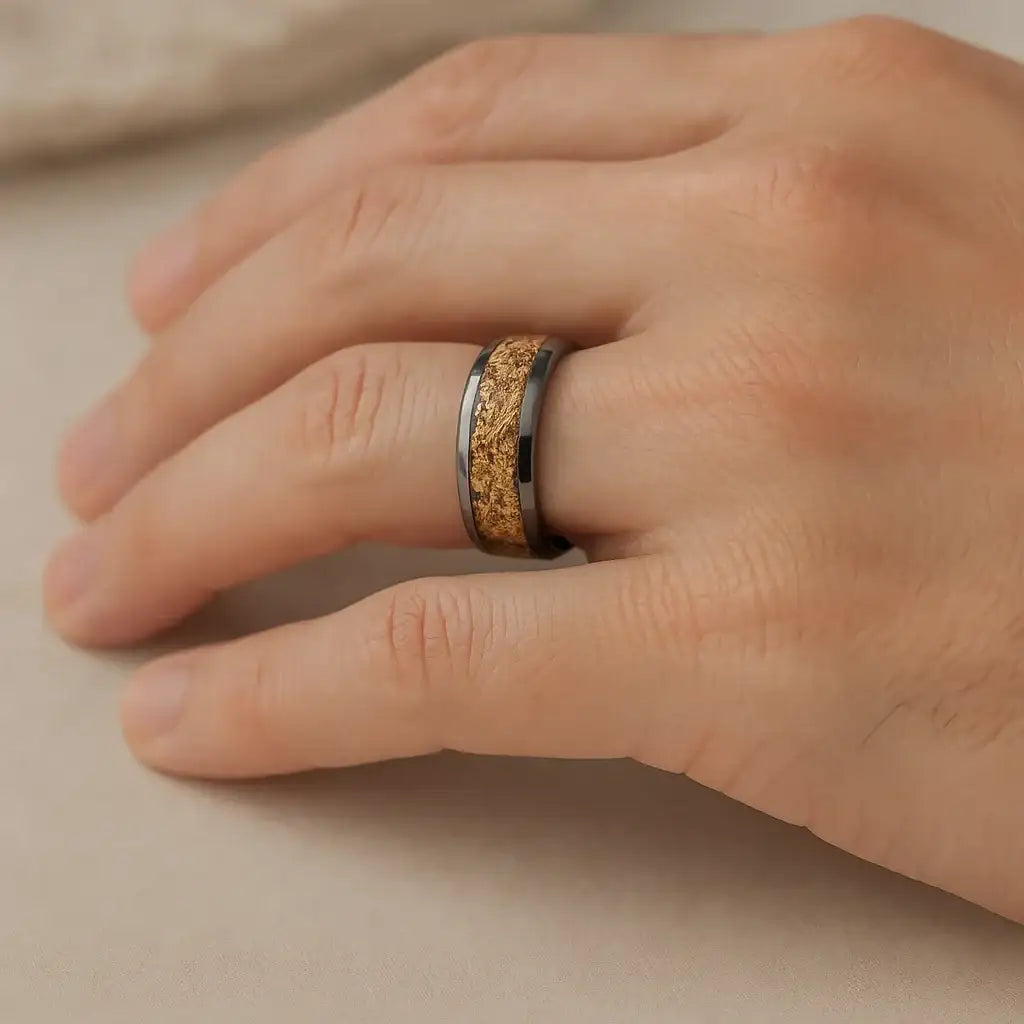 Xerxes tungsten gold flakes ring, worn on hand