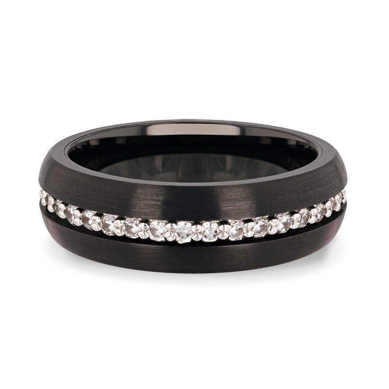 Damascus black tungsten ring with white sapphires, flat lay