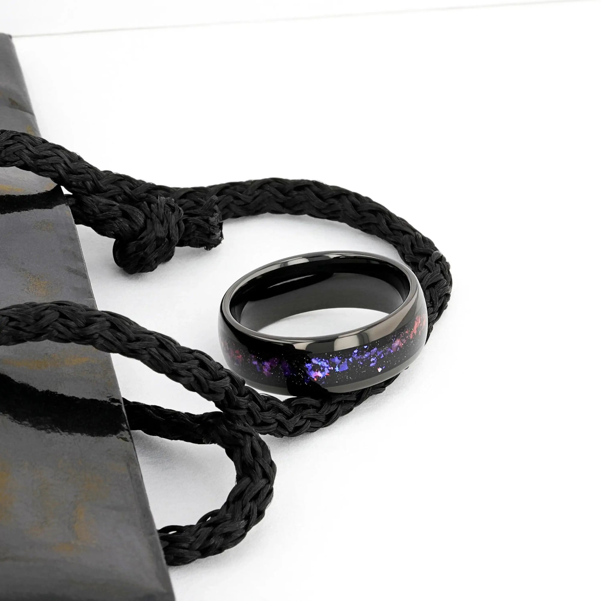 Naxos black tungsten alexandrite ring, side view