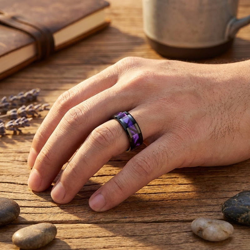 Heka black tungsten ring with purple tiger cowrie shell inlay, front view