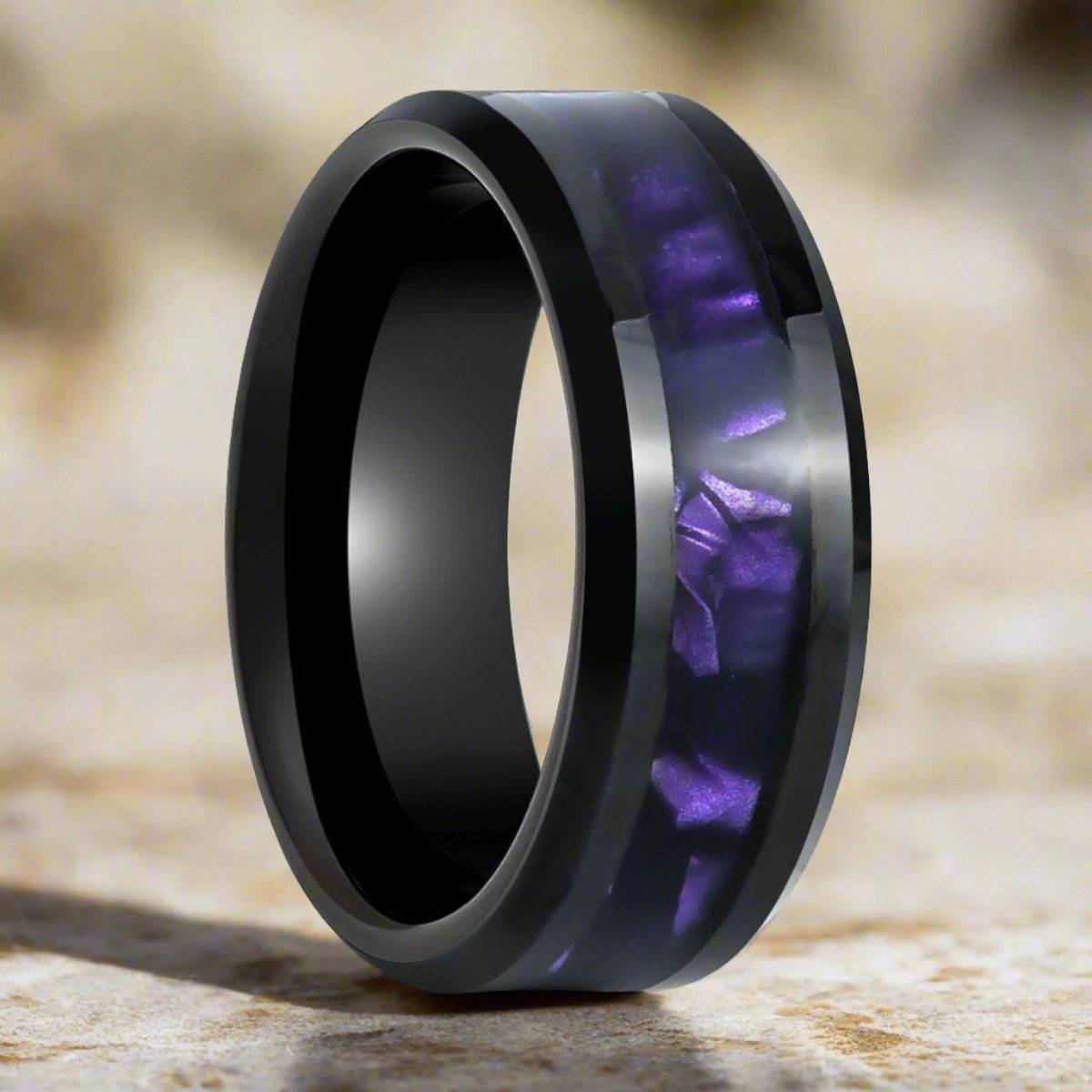 Heka black tungsten ring with purple tiger cowrie shell inlay, front view